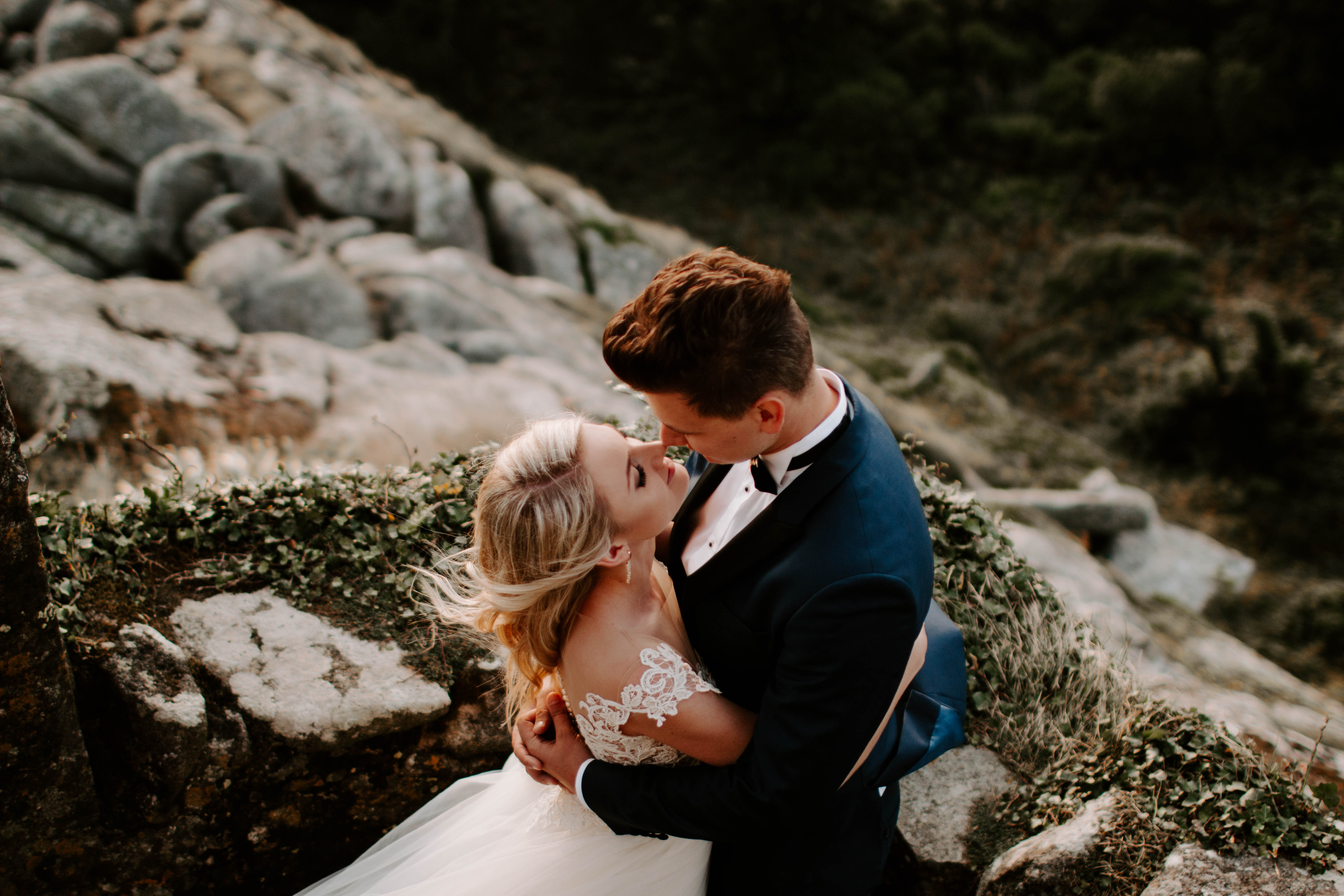 bride and groom hugging